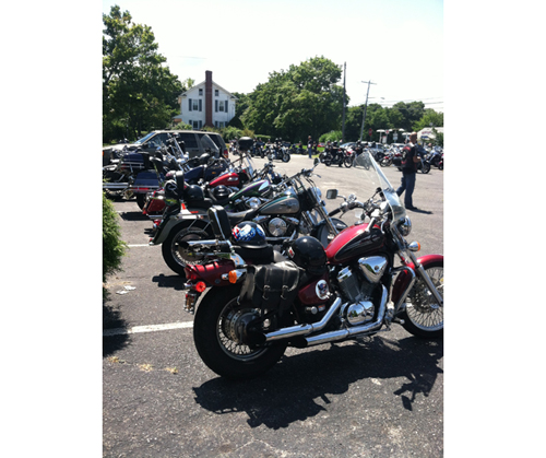 MICHAEL WHITE PHOTO | Motorcycles lined up in front of the Elks Lodge in Riverhead.