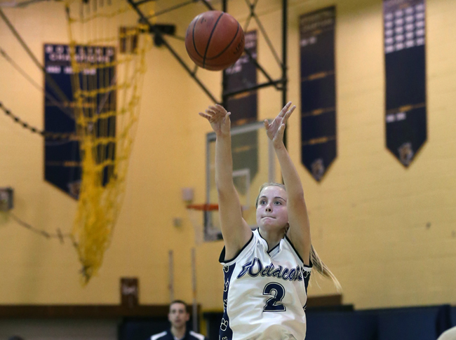 Shoreham-Wading River senior Courtney Clasen shoots a jumper in a game last month. (Credit: Daniel De Mato)