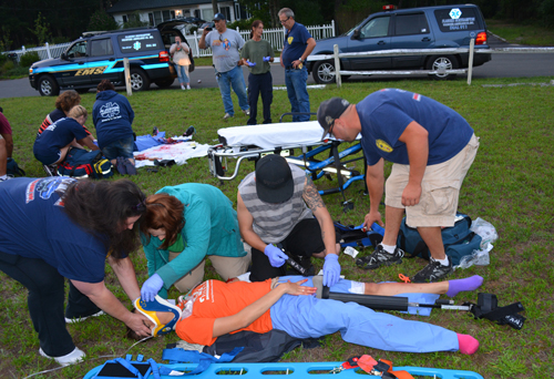 COURTESY PHOTO | Volunteers with the Flanders Northampton Volunteer Ambulance Company practice loading up a patient Monday evening.