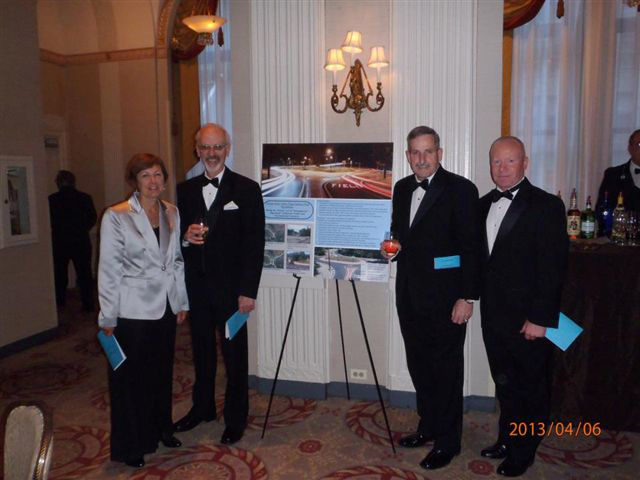 Here's a low-resolution photo that came out of the Brookhaven Town press shop in 2013. It's Councilwoman Connie Kepert congratulating engineers on an award. Notice the date stamp.