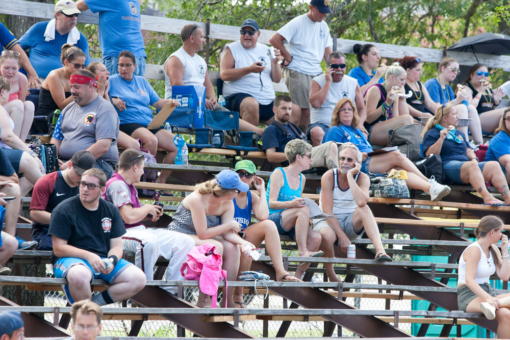 The crowd in the bleachers.