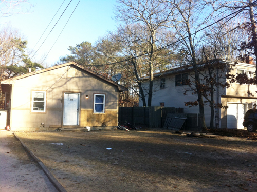 CARRIE MILLER PHOTO | The house at Riverside Avenue near Evergreen Road in Flanders, at which one person was injured after midnight Wednesday.
