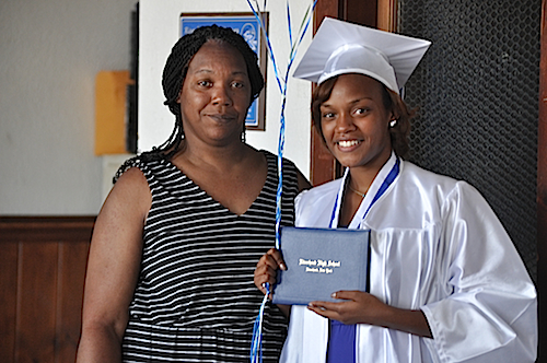 Amberlynn (left) and Lyn Fountaine posed for photos at Lyn's graduation this year, just two days after her father was injured in the fire. (Cyndi Murray photo) 