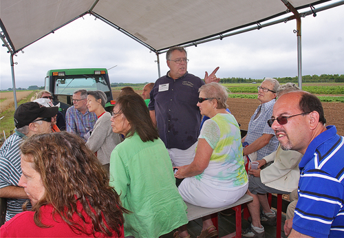BARBARAELLEN KOCH FILE PHOTO | Mark Bridgen gives a garden tour at Cornell in July.