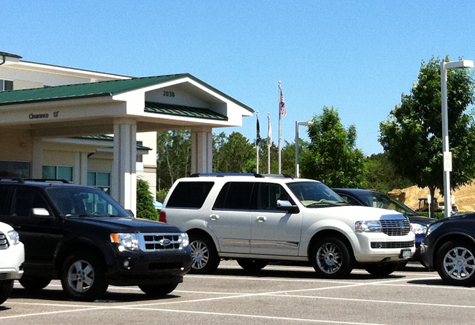 TIM GANNON PHOTO | The Hilton Garden Inn parking lot is packed Friday.