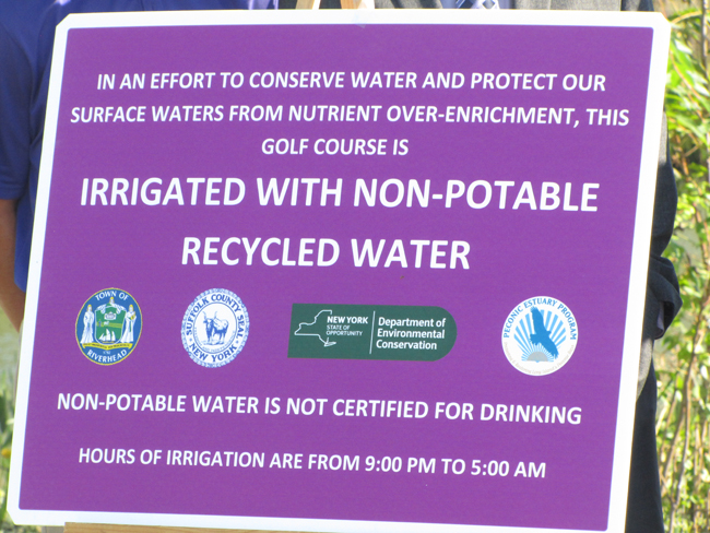 signs at Indian Island golf course describe the program to use treated sewer effluent as irrigation on the course. Tim Gannon photo.