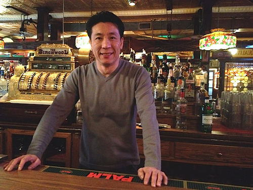 Ken Loo behind the bar at Birchwood on Pulaski Street in Polish Town. (Credit: Vera Chinese, file)