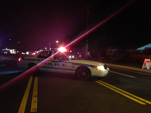 PAUL SQUIRE PHOTO | Police at the scene of Tuesday night's crash on Route 58.