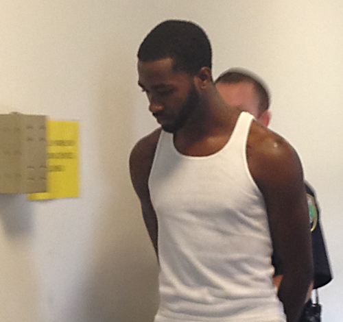 Christopher Collins is led out of Riverhead Town court Thursday morning. (Credit: Paul Squire)