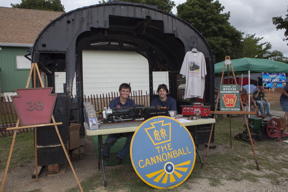 Jordan Torregrosa, left, and Ronnie Schnepf with a piece of the LIRR#39, which will be restored and placed in Pennsylvania. (Credit: Katharine Schroeder)
