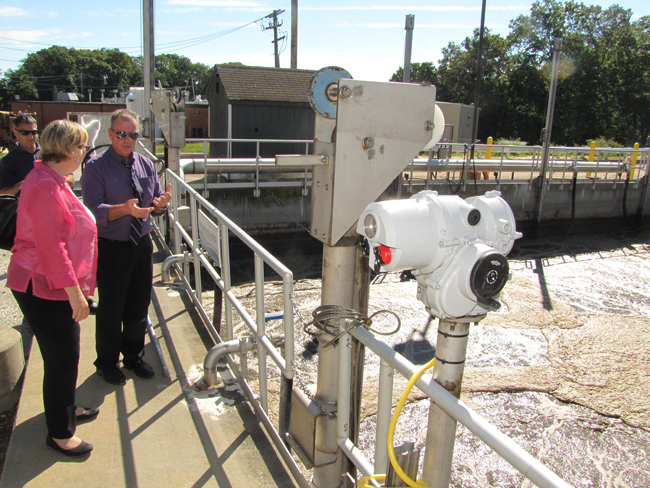 Riverhead sewer department head Michael Reichel gives a tour of the upgraded plant to EPA regional administrator Judith Enck Friday. Tim Gannon photo