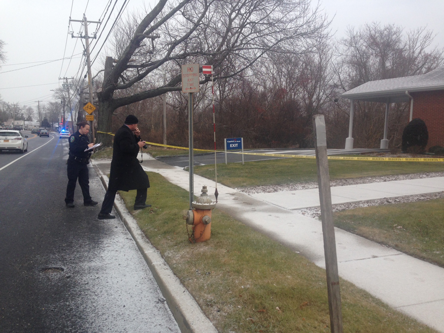 Police are investigating a robbery at Capital One bank in Jamesport. (Credit: Cyndi Murray)