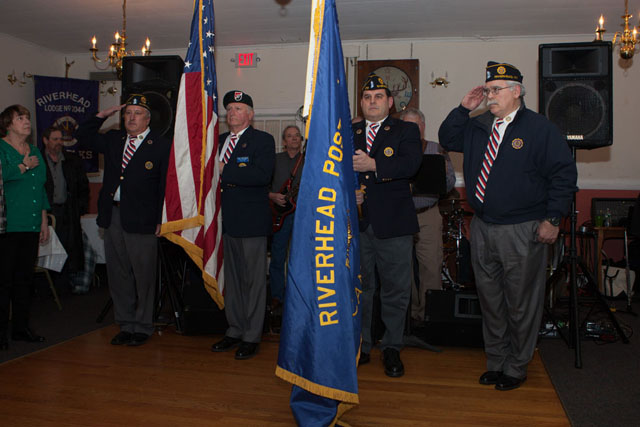 The Riverhead American Legion Color Guard opens the event with the presentation of the colors