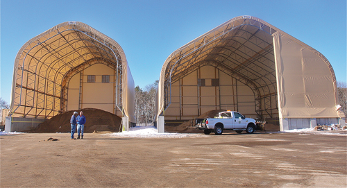 BARBARAELLEN KOCH PHOTO | Highway superintendent Gio Woodson talks with worker Don Owen last Friday morning.