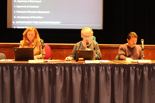Riverhead superintendent Nancy Carney (left), board president Ann Cotten-DeGrasse and board member Thomas Carson at Tuesday night's meeting. (Credit: Jennifer Gustavson)
