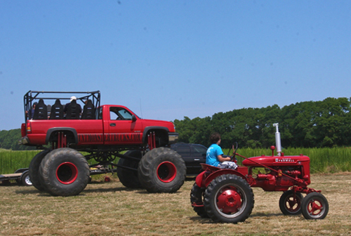 tractor BARBARAELLEN KOCH PHOTO | A 2004 Chevy Silverado Monster truck owned by Leo Terrizzi of Bohemia was giving rides around the museum farm for $5.