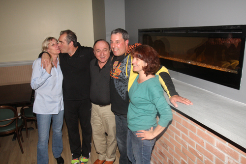CJ's American Grill owners, from left: Joanne Richards, Chris Richards and Sal Malguarnera, with Bobby Bugdin, restaurant principal, and manager Sandra Bilotti. Barbaraellen Koch photo.