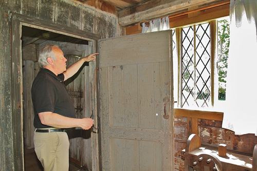 Zachary Studenroth, president of the Cutchogue New Suffolk Historical Council, notes that the settlers in the 1600's were quite a bi shorter than now. (Credit: Barbaraellen Koch photo)