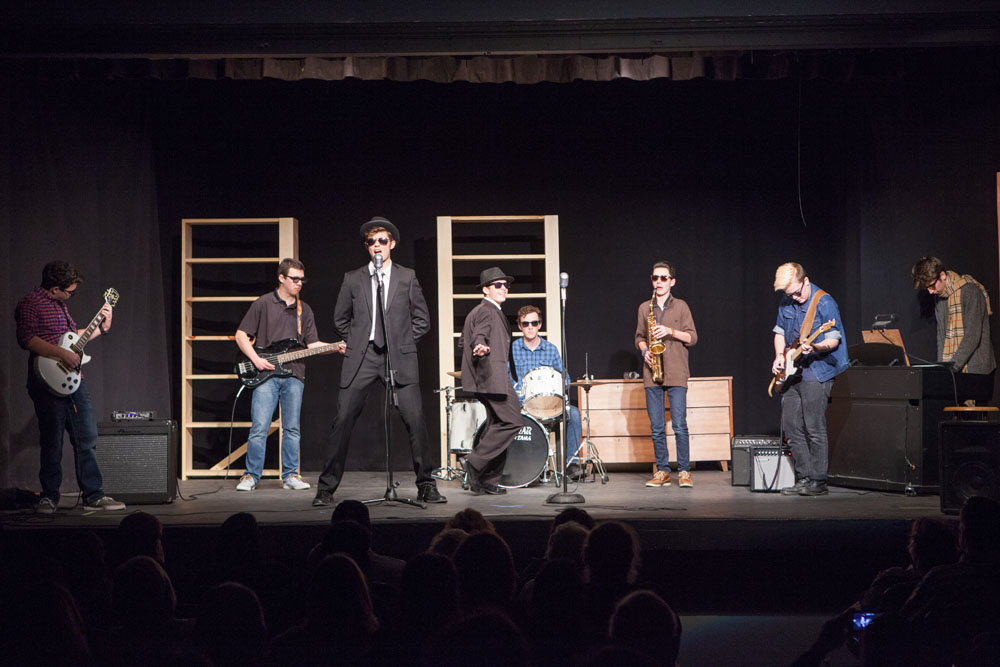 From left, Mark Moran, Connor Vaccariello, Dimitris Niflis, Sam Basel, James Thilberg, Keaton Comiskey and Patrick Connoly perform 