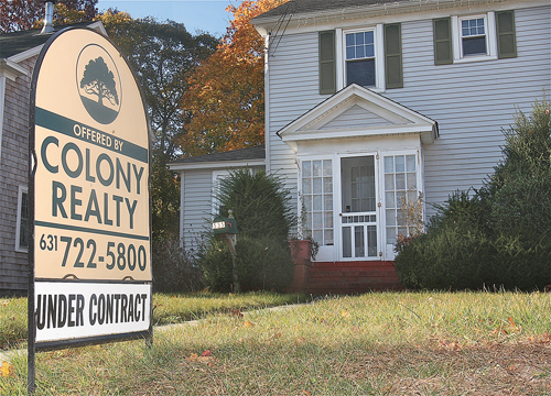 BARBARAELLEN KOCH PHOTO | A house under contract on Ostrander Avenue in Riverhead. Home sales were up in the third quarter this year, but the median sale price dropped.