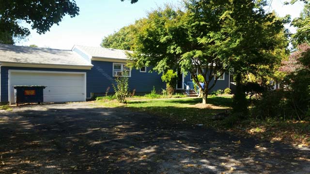 The house on South Harbor Road in Southold, where emergency officials were called following a shooting early Tuesday morning. (Credit: Carrie Miller)