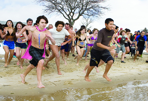 Intrepid souls hit the water at the start of last year's Peconic Plunge to benefit Maureen's Haven at Veterans Memorial Park in Mattituck.