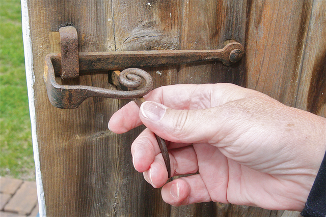 The door to the Fresh Pond Schoolhouse still has its original hardware. (Credit: Barbaraellen Koch)