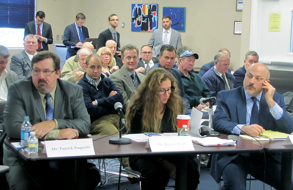 The U.S. House of Representatives Committee on Natural Resources held a hearing Tuesday in Riverhead to discuss protecting the area’s seafood economy. From left: Basic Strategies owner Patrick Paquette, Long Island Commercial Fishing Association executive director Bonnie Brady and Garden State Seafood Association executive director Greg DiDomenico.(Credit: Tim Gannon)